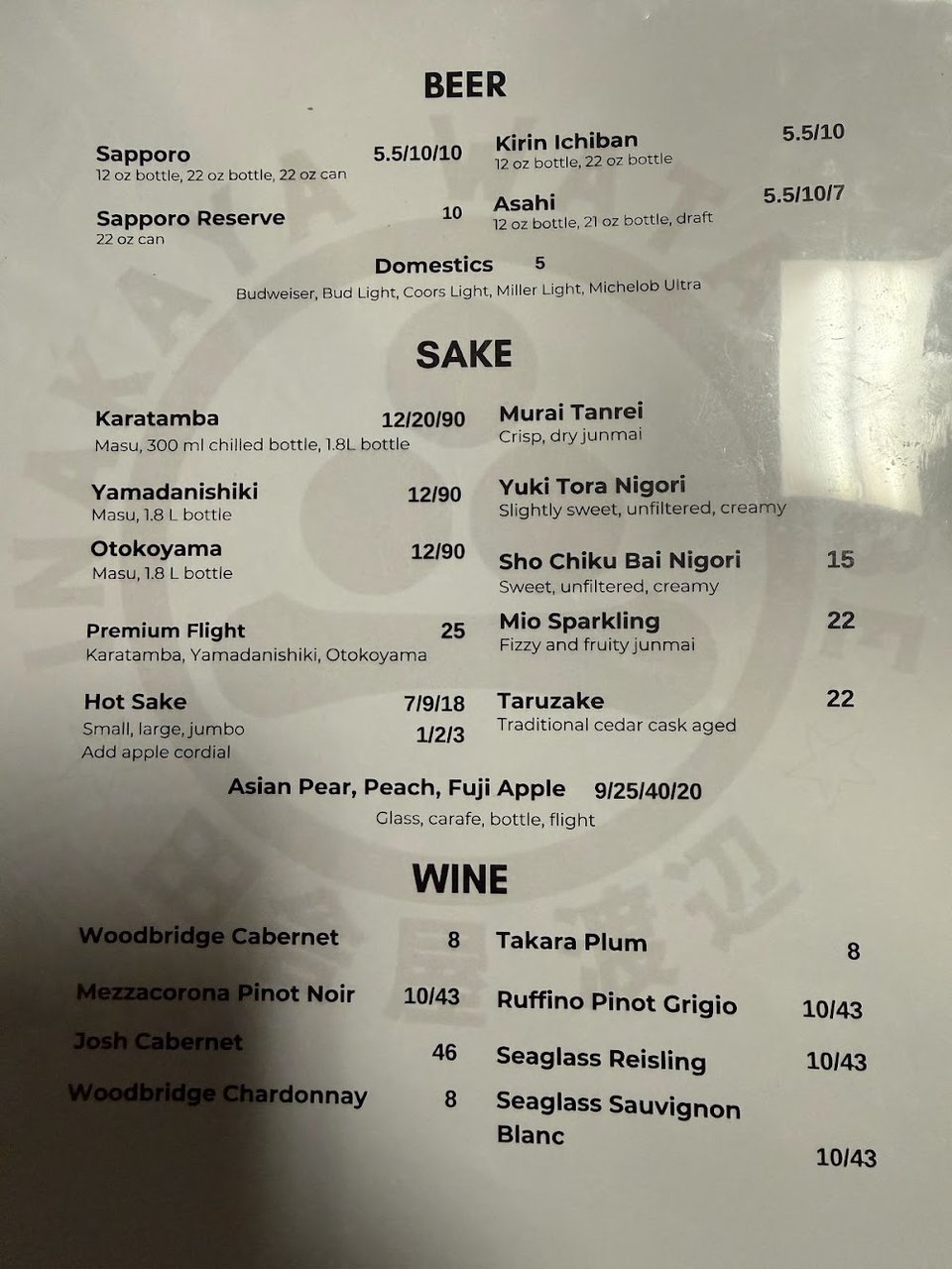 Japanese menu pages showing salads and appetizers.